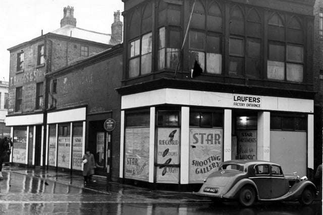 The junction of Albion Street in November 1946 and St Ann Street. All the shop windows have advertisements for 'Star', an amusement arcade and shooting gallery.  Also in view is the factory entrance of Laufers, wholesale clothiers.