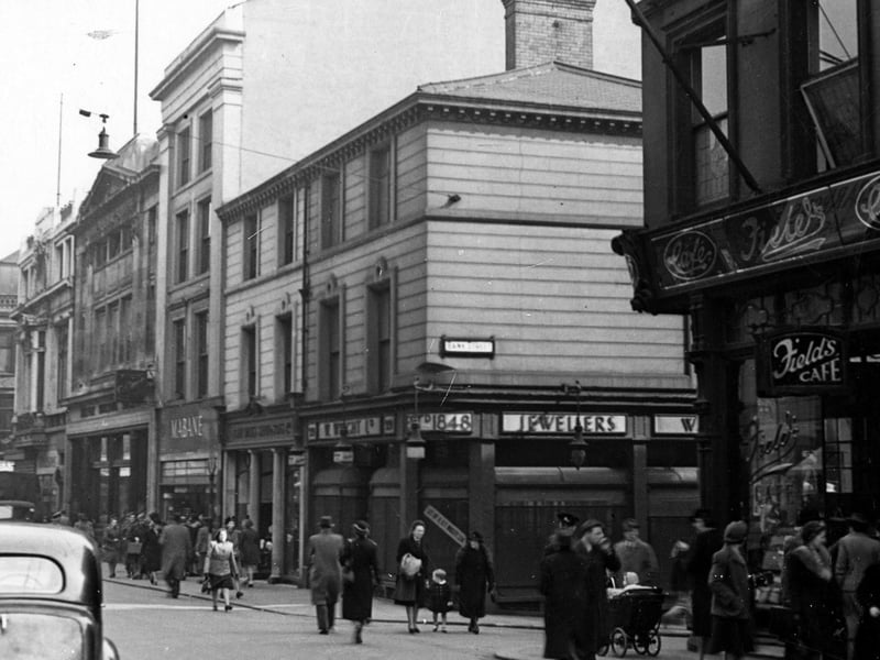 Commerical Street in April 1945. This view is at the junction with Bank Street. Field's cafe can be seen on the right opposite W. Wright jewellers shop.