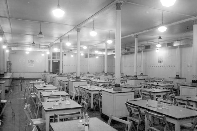 The dining room of a British Restaurant, a cheap public eating place during World War II, at Leeds Town Hall pictured in August 1942.