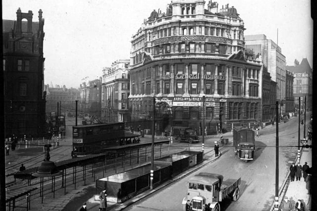 Looking north at the point where Infirmary Street (on the left) and Park Row (on the right) meet City Square in December 1943.