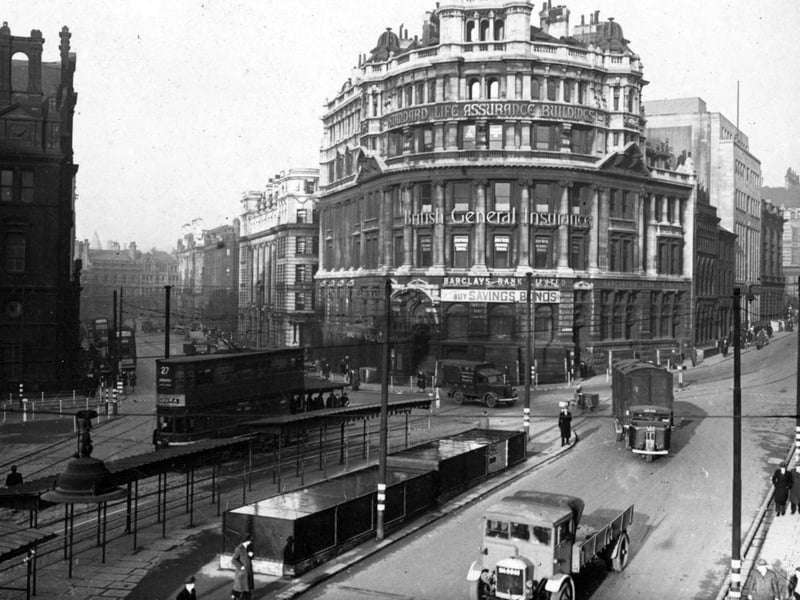 Looking north at the point where Infirmary Street (on the left) and Park Row (on the right) meet City Square in December 1943.