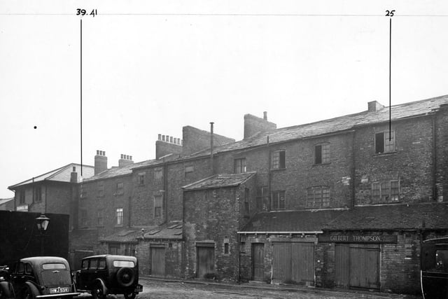 Back George Street in October 1947. G. Thompson fruit salesman and Chadwick and Son fruit salesman are visible.