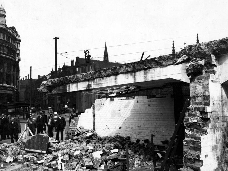 The demolition of air raid shelters in City Square in August 1946. Standard Buildings with Barclays Bank local head office, Standard Life Assurance and British General Insurance are visible in the background.
