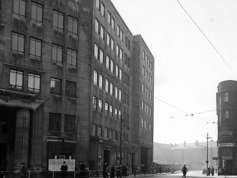 Aire Street looking from City Square in May 1944. On the left is the stone built City station with part of the main entrance and the goods entrance clearly seen.