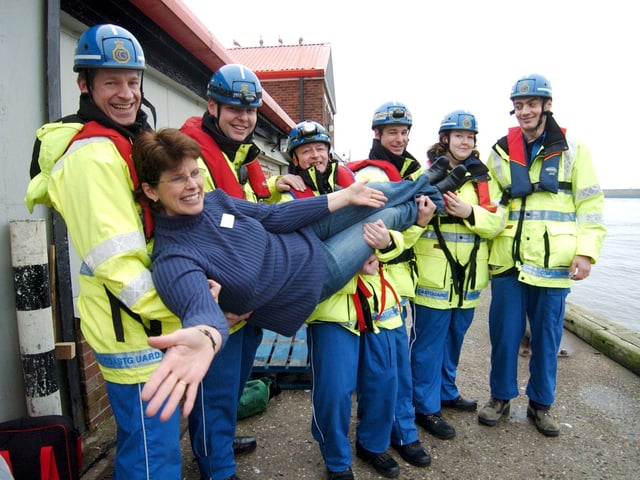 Super slimmer Stevie Muscroft is pictured with some of Whitby’s coastguard team.