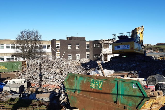 A large part of the old hospital building is now rubble.