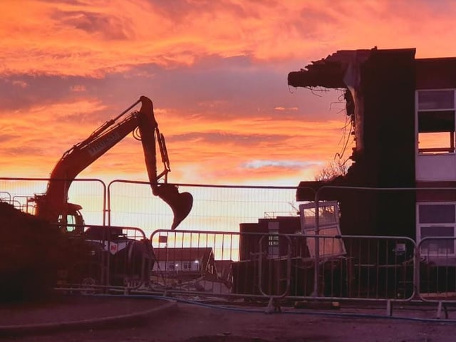 The partly demolished Whitby Hospital site at sunset.