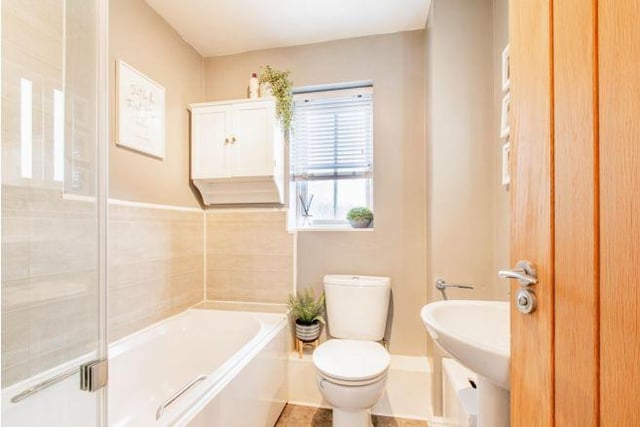 The family bathroom is a bright and modern space.