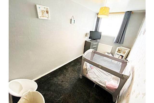 The third bedroom is smaller and could be used as a single bedroom or converted into a home office.