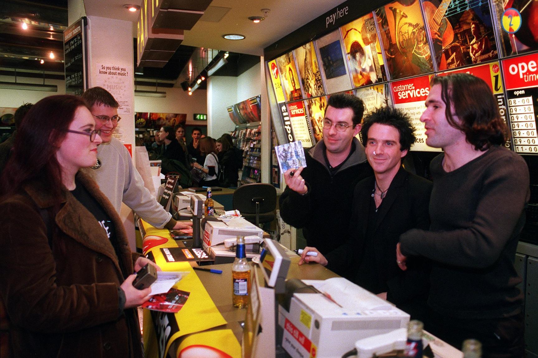 Pop stars Three Colours Red visited the Virgin Megastore on Albion Street in February 1999 to promote their latest album. Pictured, from left, are Ben Hardman, Chris McCormack and Keith Baxter.