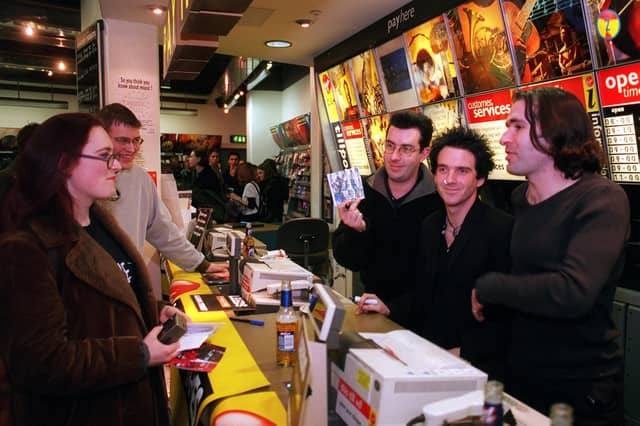 Pop stars Three Colours Red visited the Virgin Megastore on Albion Street in February 1999 to promote their latest album. Pictured, from left, are Ben Hardman, Chris McCormack and Keith Baxter.