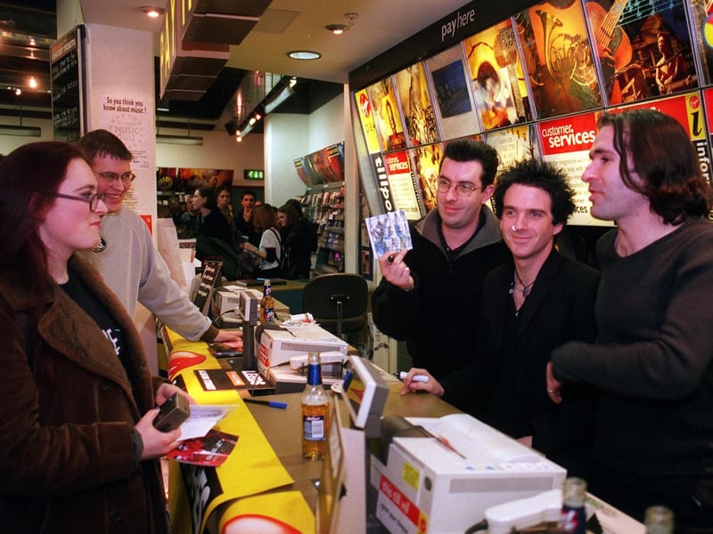Pop stars Three Colours Red visited the Virgin Megastore on Albion Street in February 1999 to promote their latest album. Pictured, from left, are Ben Hardman, Chris McCormack and Keith Baxter.