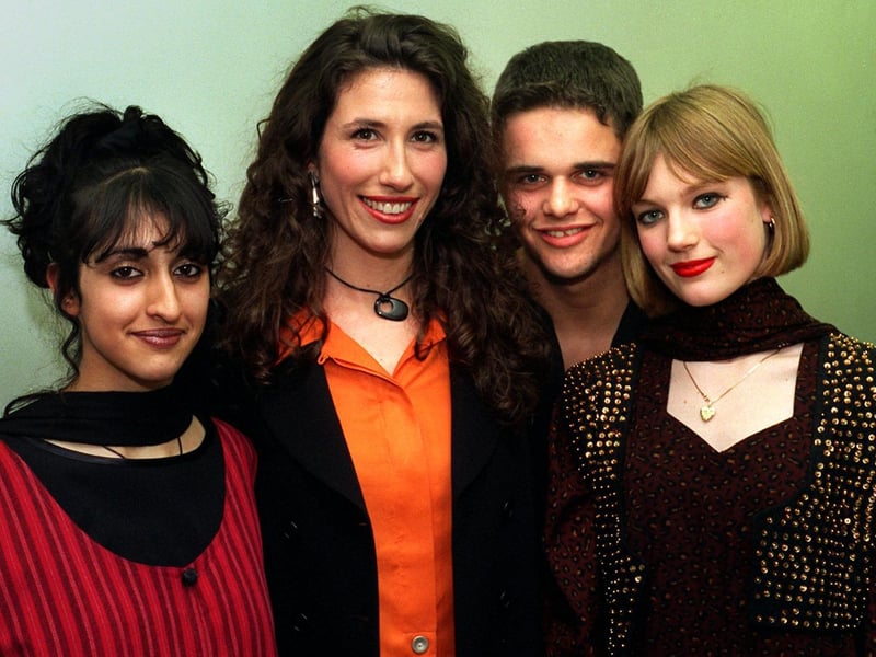 Gaynor Faye, better known as Coronation Street's Judy Mallett, visited West Leeds High School to enjoy a multi-cultural extravaganza in March 1996. She is pictured with pupils Nazish Razool, David Hobson and Sarah Brown.
