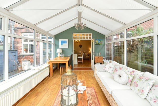 The conservatory provides a flexible space between house and garden.
