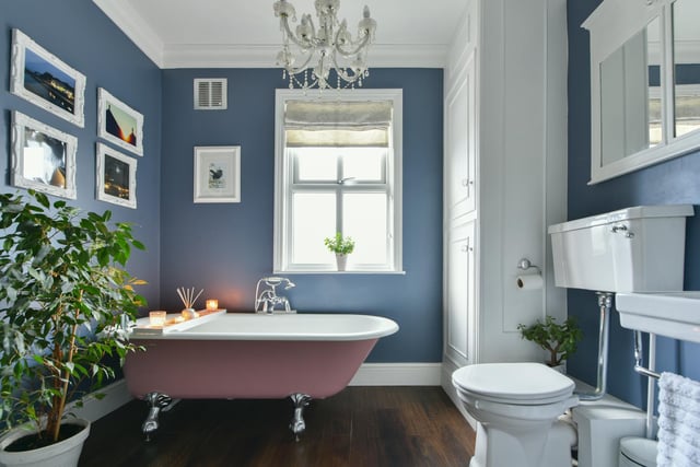 Bathe in style, within this bathroom that has just as much charm as other rooms.