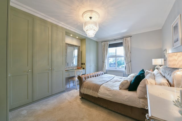One of the property's double bedrooms with built-in wardrobes.
