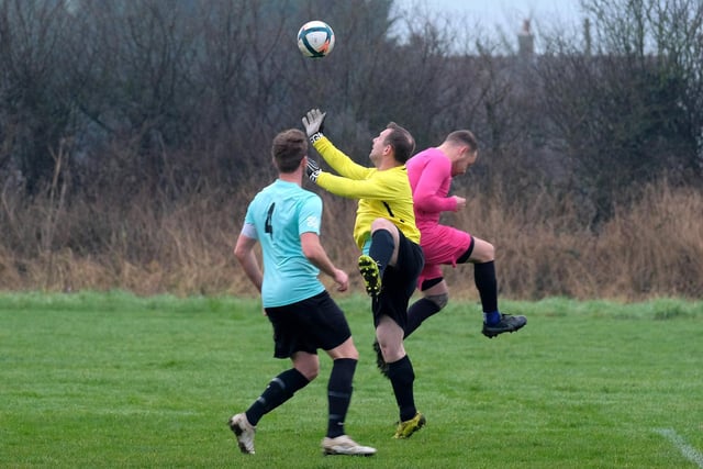 Player-boss Chris Milburn looks to gather the ball for visitors Eastfield United at Cayton
