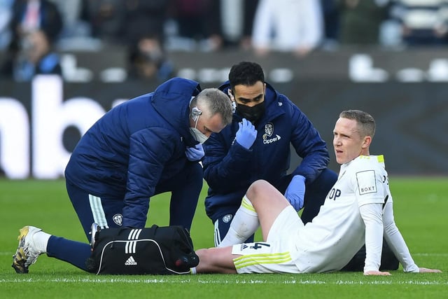 Adam Forshaw goes down with an injury.