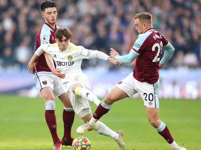 Jarrod Bowen and Declan Rice work together to dispossess Premier League debutant Lewis Bate.