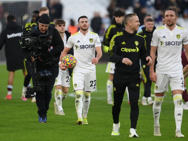 Jack Harrison walks off the pitch with the matchball.