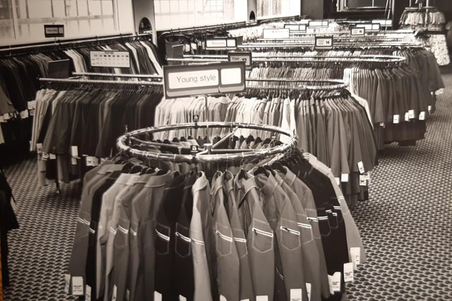 More racks of coats and jackets on the upper floor of C&A, possibly when the store first opened. Young styles are hung on the rail in the foreground