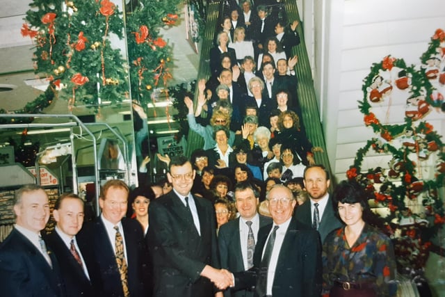 Jubilant scenes at Lewis's when the future of the flagship store had been secured - for a couple of years anyway - back in 1991. Piers Hedley (left), Lewis's chairman is congratulated by Coun Ivan Taylor, Jim Mason, Coun Fred Caber and Coun Louise Ellman - with staff