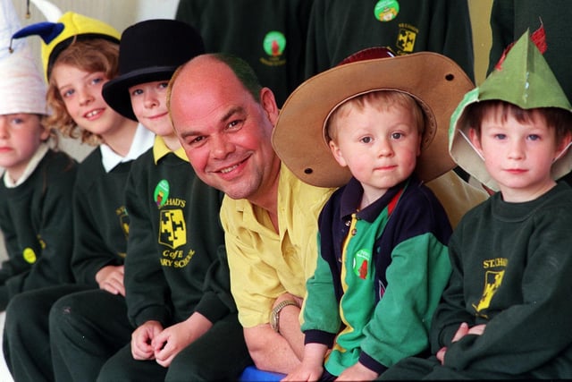 Chris Leetham, headteacher at St Chad's C of E, dyed his hair in the school colours to raise funds for the NSPCC in May 1999. He is pictured with some of his pupils.