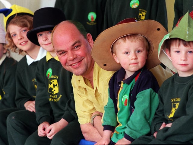 Chris Leetham, headteacher at St Chad's C of E, dyed his hair in the school colours to raise funds for the NSPCC in May 1999. He is pictured with some of his pupils.