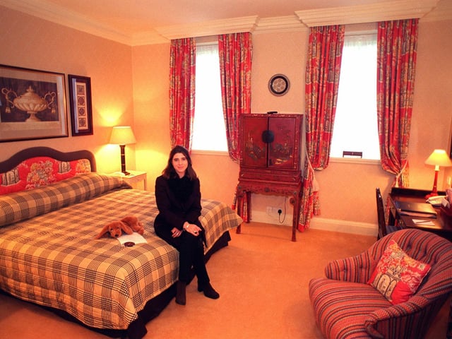 This is interior designer Claire Schofield pictured in her Chinese designed bedroom at Haley's Hotel in December 1997.