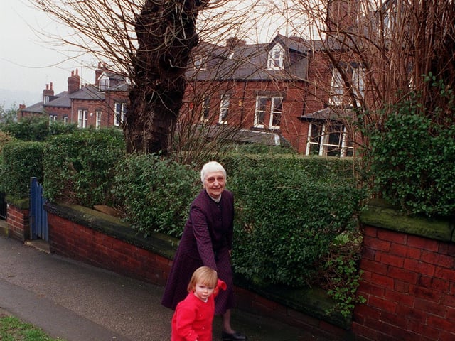 This is Christine Fenton of Woodland Park Road who was leaving the street after 45 years. She is pictured the street's youngest resident Amy London.