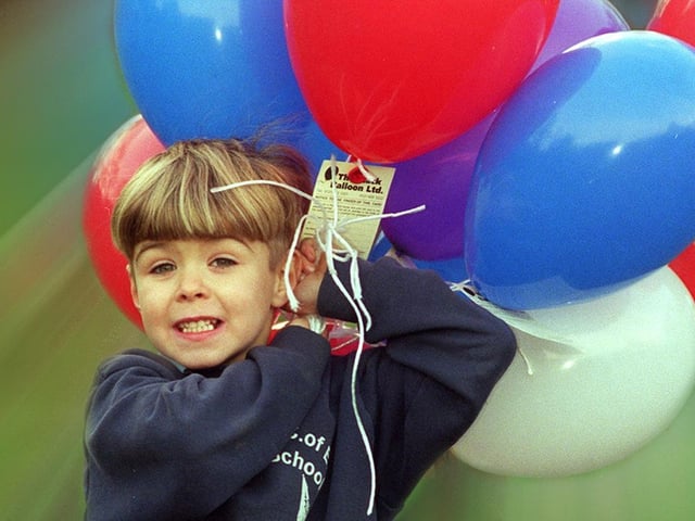 Pupils at St Michael's C of E took part in a balloon release in December 1998 to raise funds for a new school building. Pictured is Jonathan Daniels.
