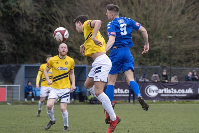 An aerial battle for the ball in Pontefract Collieries' match with Marske United. Picture: Scott Merrylees.