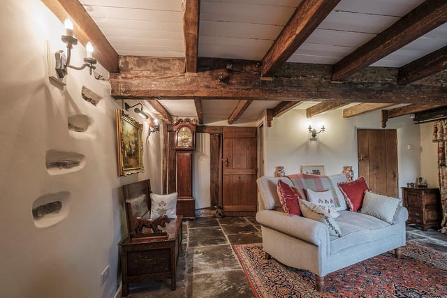 Wooden doors, beams and stone flagged floors all hark back to the past of this characterful period building. (Photo: David Thornton)