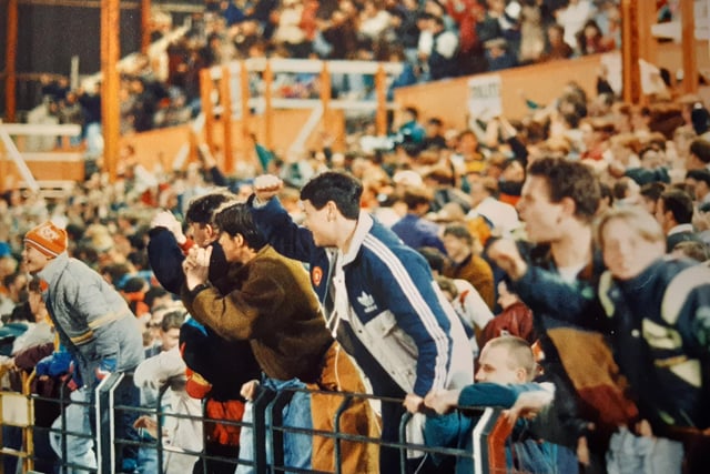 These fans were cheering their time when they played Cardiff - but when was it?