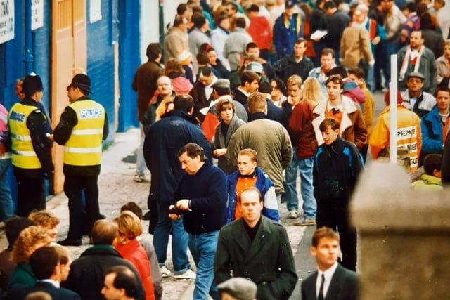 Football supporters ahead of a game in November 1991