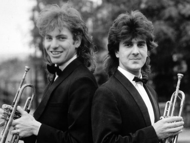 These two Leeds men were blowing their own trumpets in a musical partnership in September 1986 which could soon be expanding to the US. Former Household Cavalry trumpeters Richard Winckles, right, and Charles Faulkner, both from Headingley, set up in business performing fanfares at special occasions.