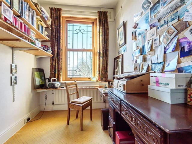 The fifth bedroom is currently being used as an office.