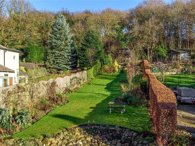 The very large rear garden which extends as far as the eye can see.