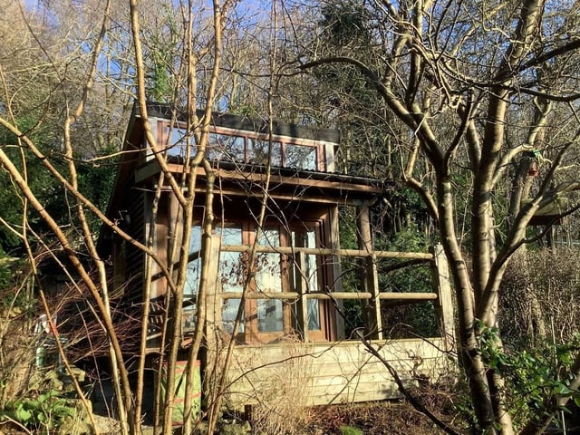 At the end of the garden is a stylish wooden summerhouse. It has mains water and power, and a phone line connection for WIFI, so would make an idea home office.