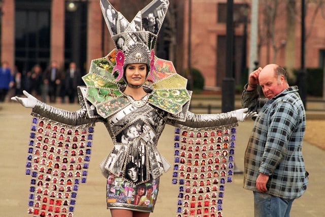 Model Fiona Finney shows off a costume made entirely of photographs. It was designed by Christine Hughes and created to promote the UK year of photography and electronic image.
