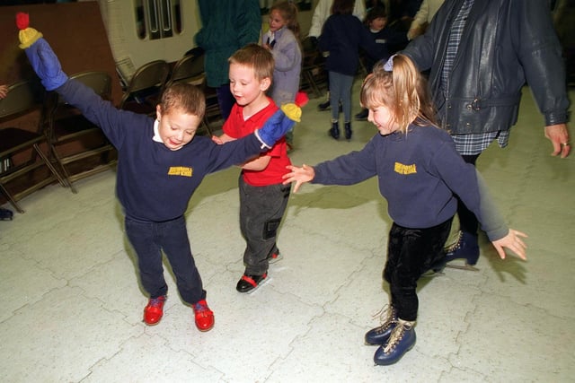 Pupils at Brownhill Primary enjoyed a cool attraction. A temporary ice skating rink was put up. Pictured, from left, are Jamie Smith, Lee Fallas and Keely Bage.