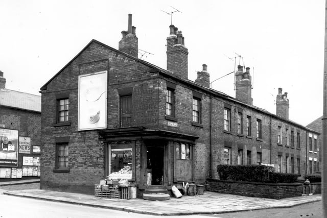 A greengrocers shop at the corner of Armley Road and Picton Place pictured in February 1964. A very old faded sign has the name H. Laxton, fish, rabbit and poultry salesman. Hargrave Laxton was listed in Kelly's Directory of Leeds for 1947.