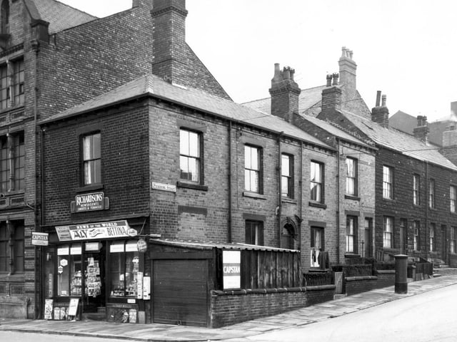Canal Road at the junction with Pickering Street in February 1964 showing the corner premises of W.R. Richardsons newsagent. The shop is adjacent to Carlton Works seen far left.