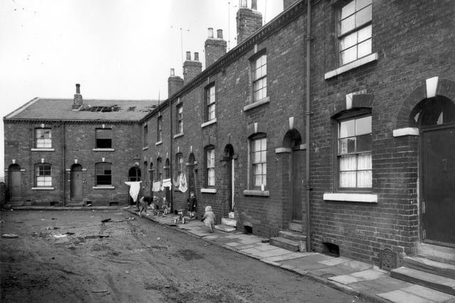 Castleton Terrace, pictured in February 1964, was comprised of 12 houses which formed an 'L' shape seen here.