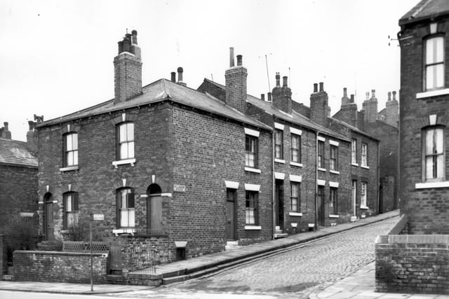 Armley Road with Rillington Street running towards the right in February 1964. All property in view was included in slum clearance plans for the area.