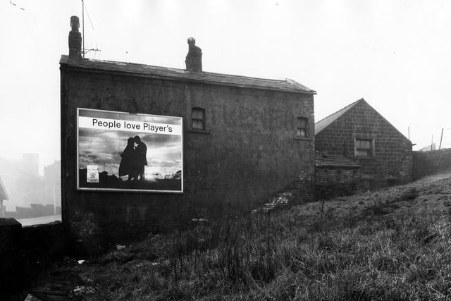 A large advertisement for Players cigarettes at the side of Canal Road in February 1961.