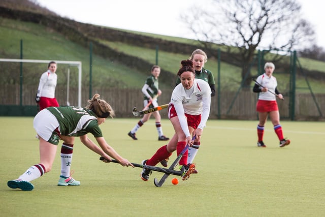 Sarah Woodhead challenges for the ball during the match between Halifax women's thirds and Leeds University.