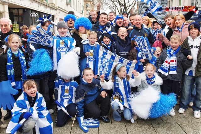 The Crawford family from Worsley Mesnes and friends show their support for Wigan Athletic.