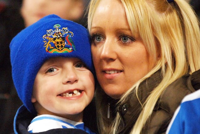 Still smiling - a young Latics fans after defeat at the Carling Cup Final between Wigan Athletic and Manchester United at the Millennium Stadium, Cardiff, on Sunday 26th of February 2006.