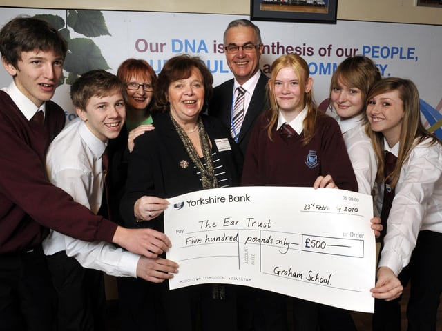 Graham School pupils present £500 to the Ear Trust, raised at their Christmas fair. From left, Laurence Marshall, John Halkyard, Lorraine Hardy, Breeda Barry (of the Ear Trust), Kevin Dengate (associate headteacher), Chelsea Rodgerson (whose little sister has ear implants), Lydia Mountford and Hannah Hodgson.